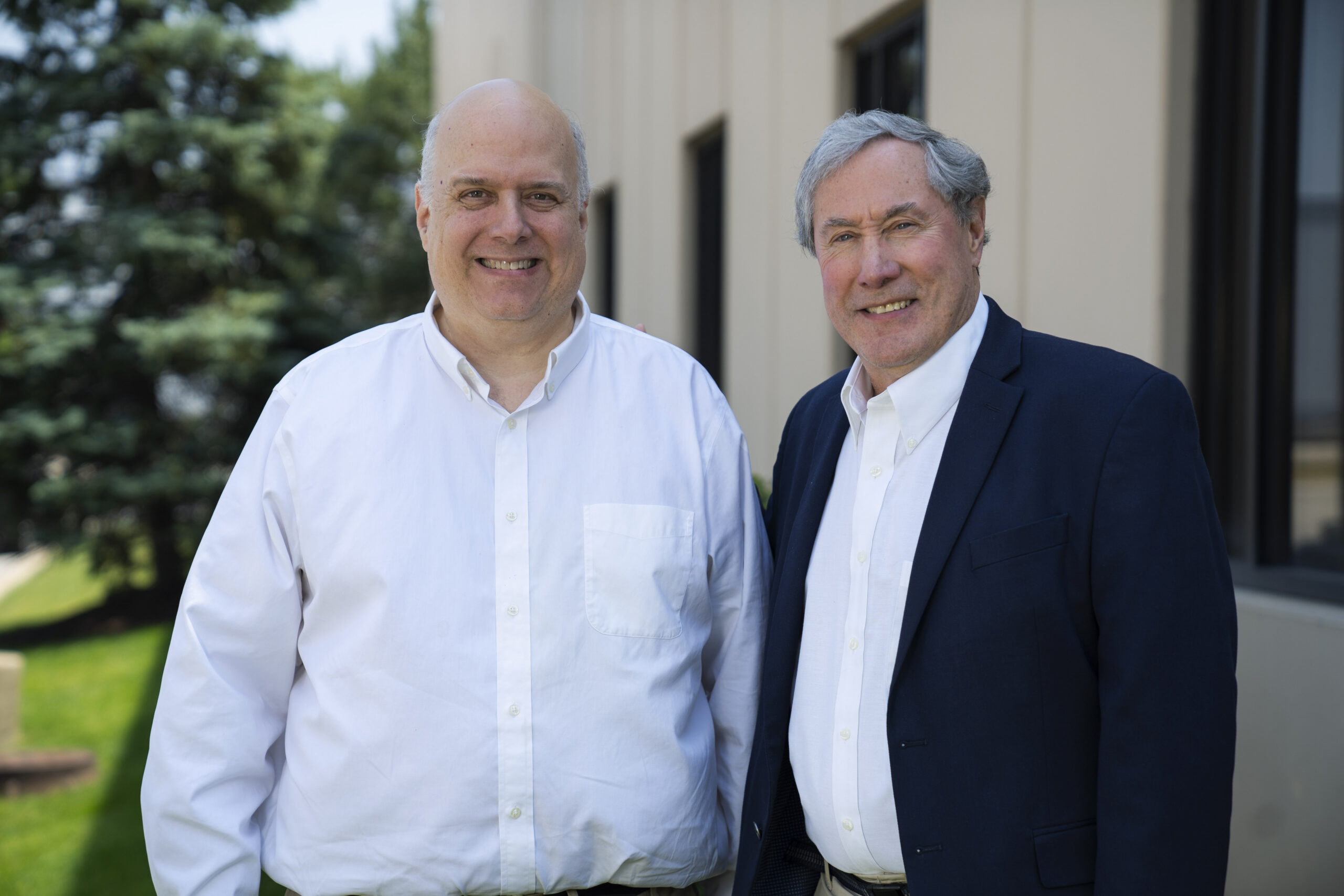Numina Group leadership outside the Woodridge, Illinois headquarters.